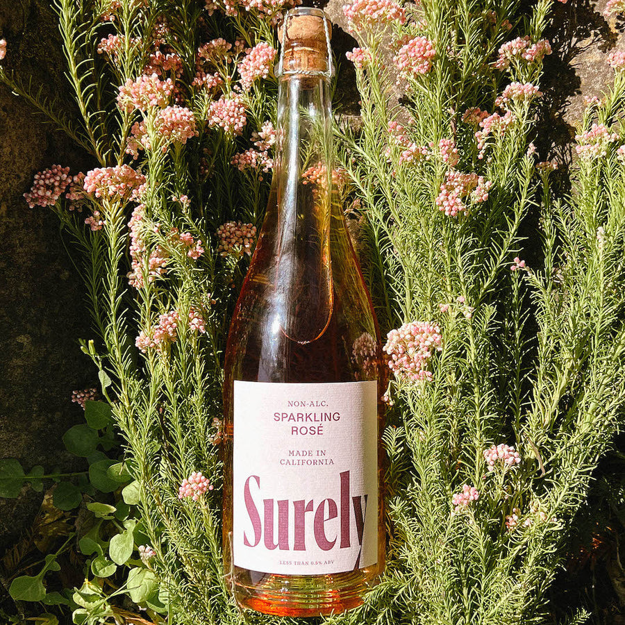 Non-alcoholic Sparkling Rosé Surely Bottle On Flowers